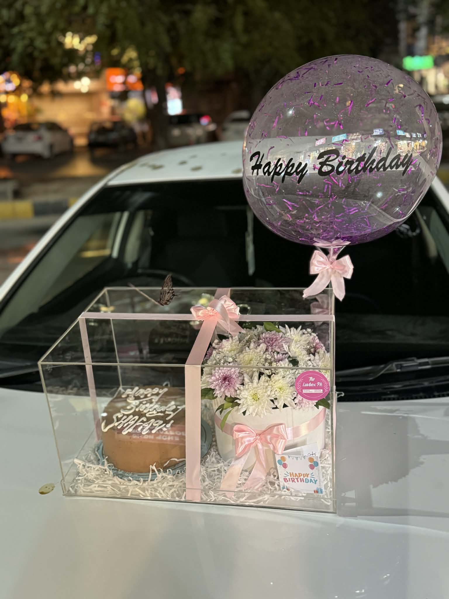 Luxury acrylic box with custom balloon, cake, and flower box.