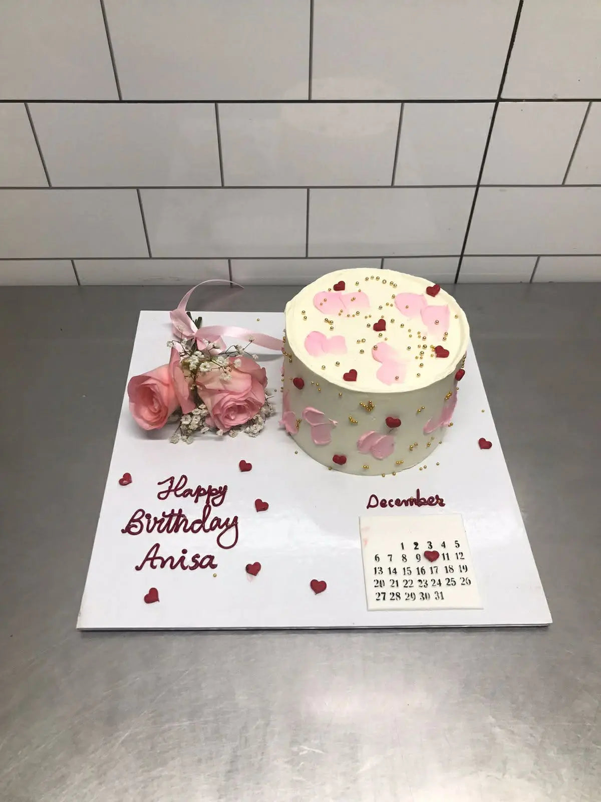 Luxury birthday tray with 2 lbs custom cake, calendar print, and floral decor.