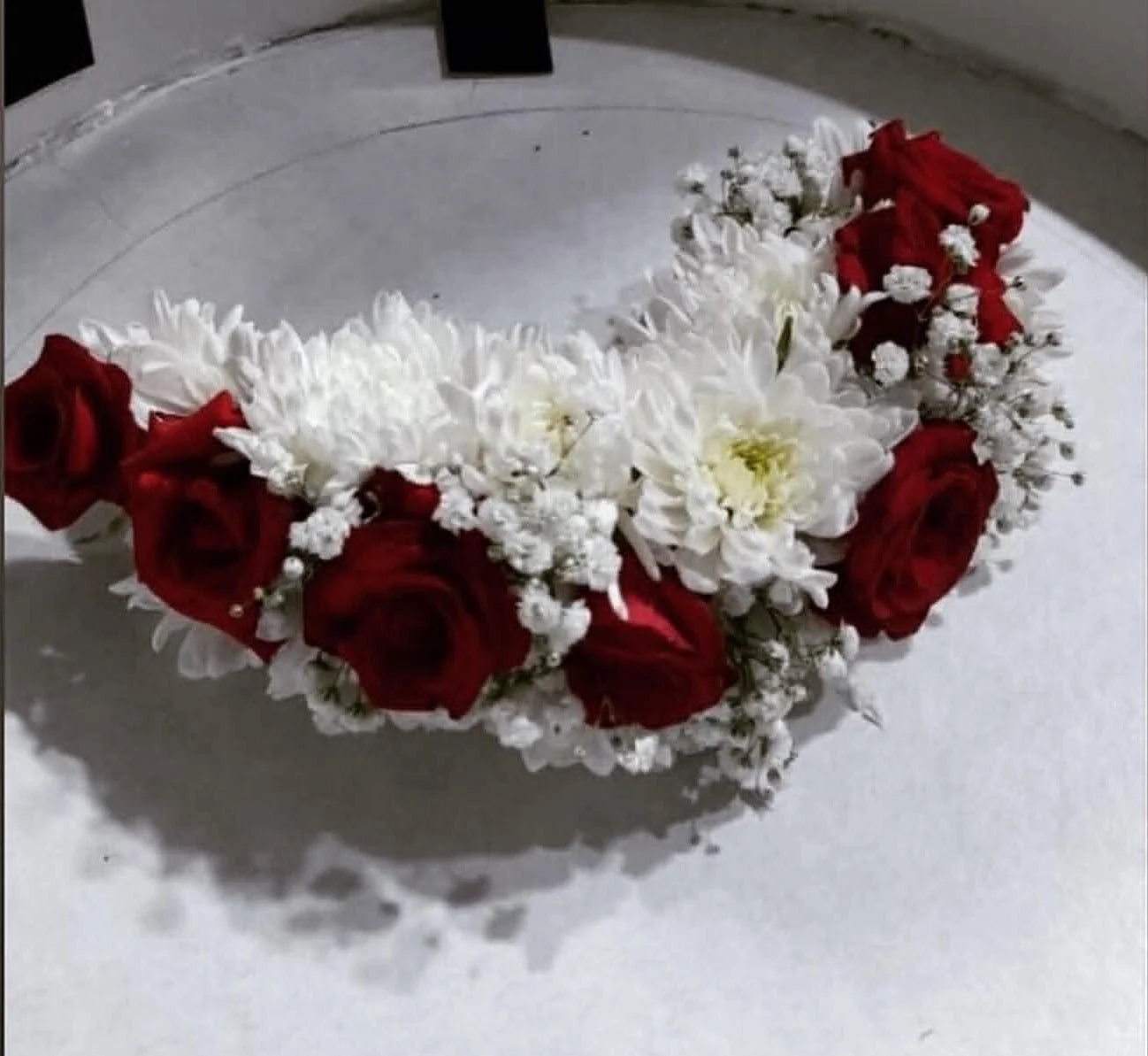 Luxury bridal floral joora gajra handcrafted with fresh flowers for bridal hair, Nikah, Mehndi, Mayun, and wedding ceremonies in Pakistan.