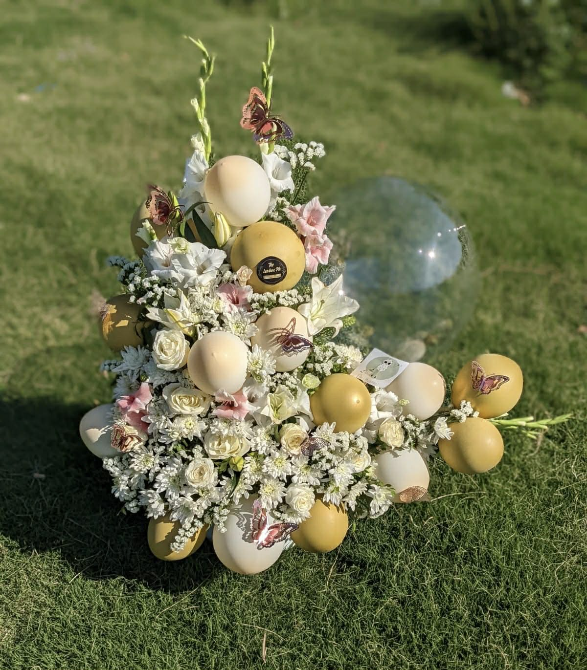 Luxury Eid Mubarak balloon arch flower box arrangement in Islamabad