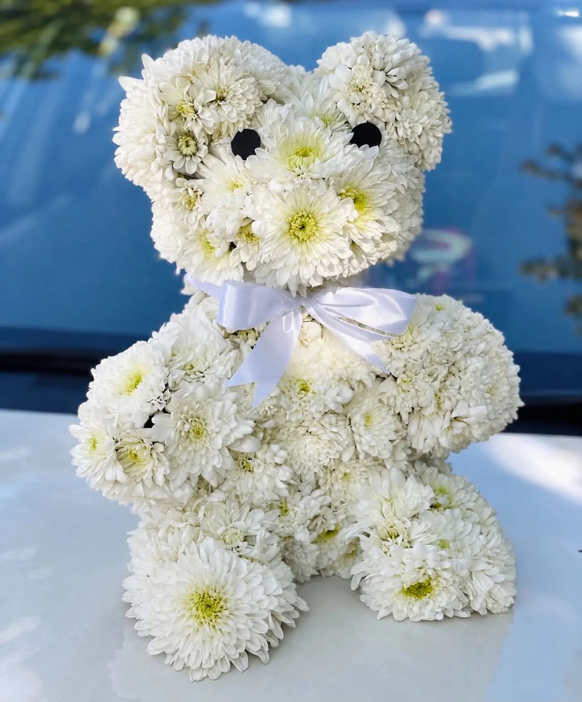 2–3 feet teddy bear made with fresh white chrysanthemums anniversary gift Pakistan