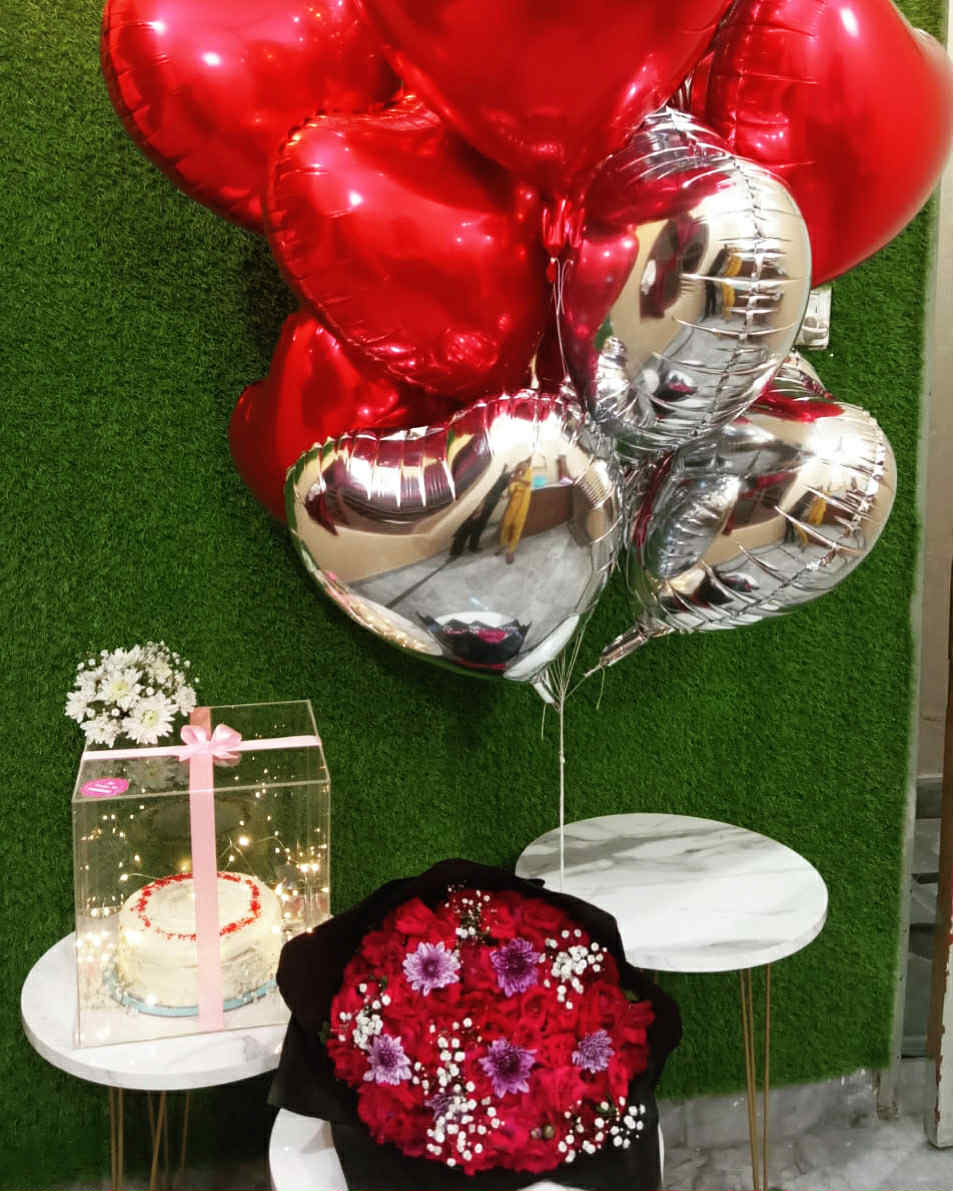 Grande Rose Affair Combo with roses, cake, and balloons from gift shop in Islamabad
