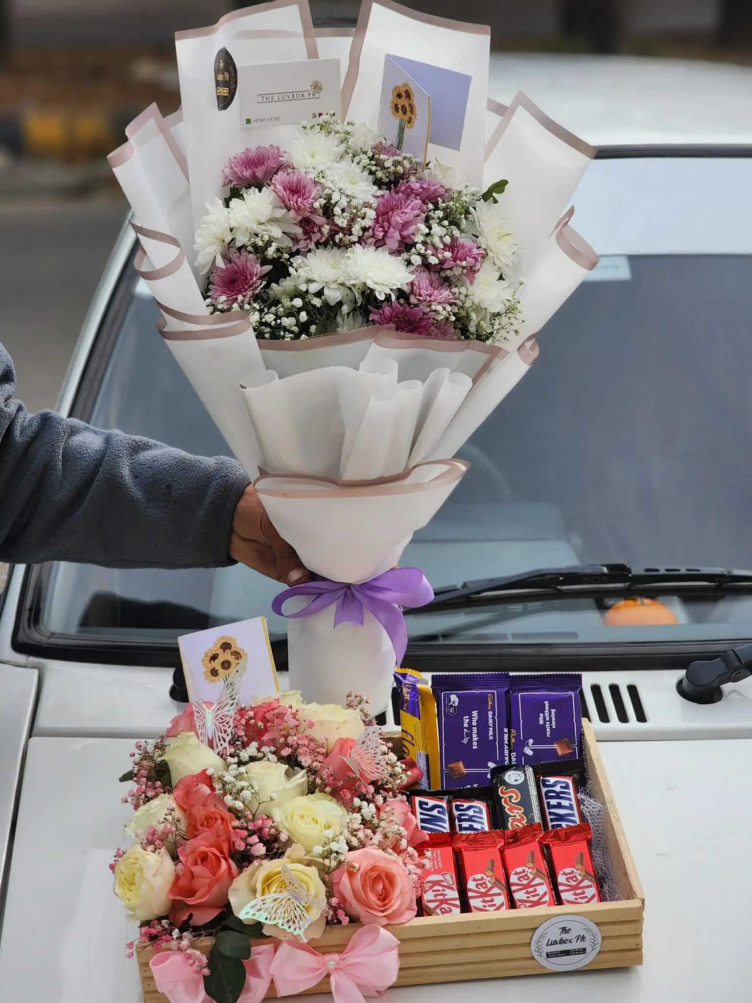 I miss you gift combo with mini flower bouquet, chocolates and wooden tray.