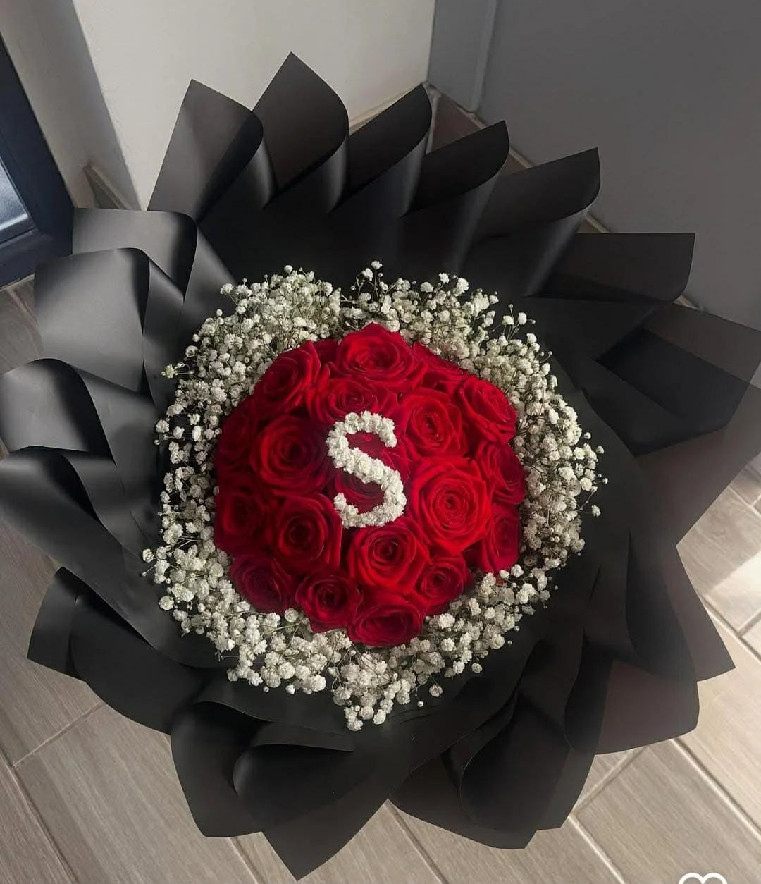 Luxury round red rose bouquet with floral letter S and baby’s breath in Islamabad