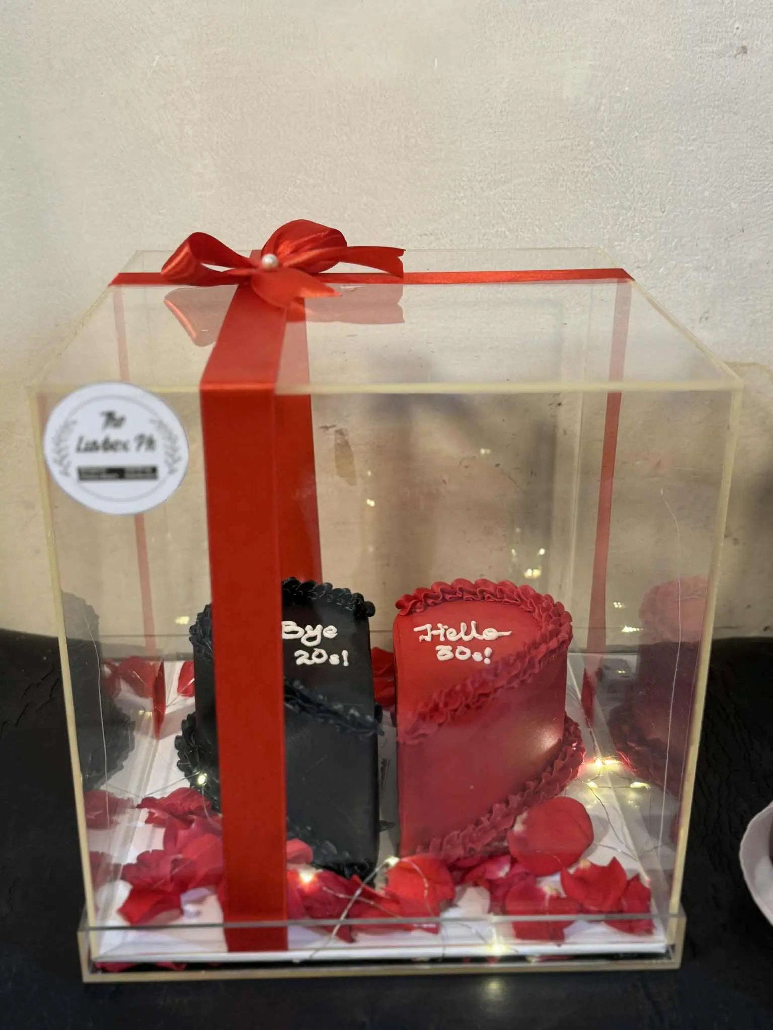 Luxury 3 lbs split-heart cake in acrylic box, premium birthday gift in Islamabad.