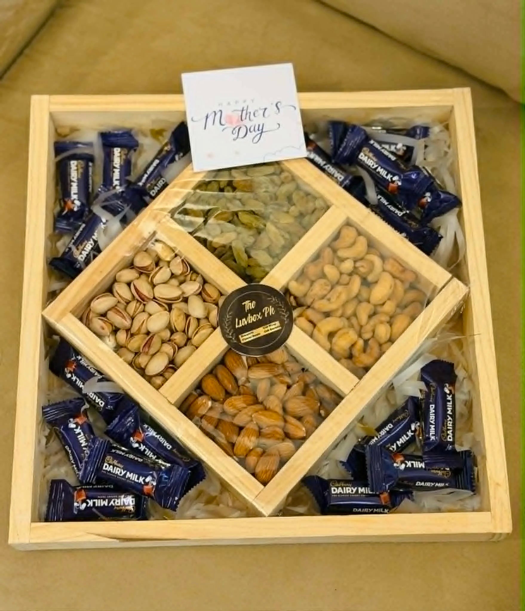Luxury wooden tray with dry fruits partitions and mixed chocolates sides premium gift Pakistan delivery