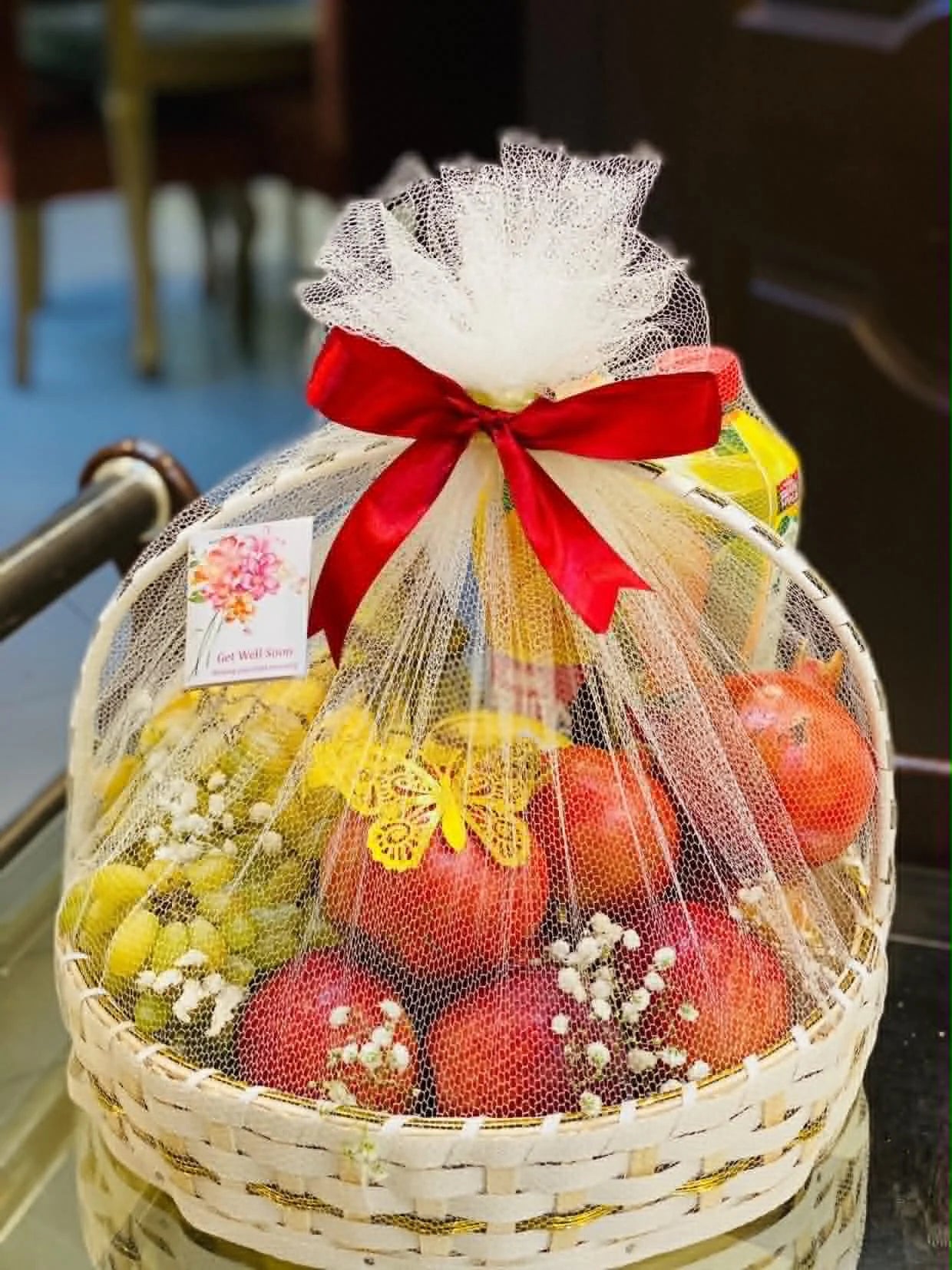 Premium seasonal fruit basket with 4–5 kg of fresh mixed fruits, beautifully wrapped for birthdays, get well soon gifts, and luxury gift delivery in Pakistan.
