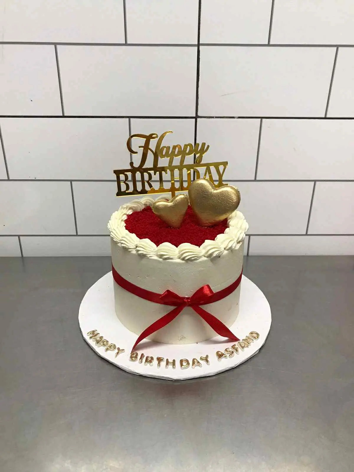 2 lbs red and white birthday cake with cake topper