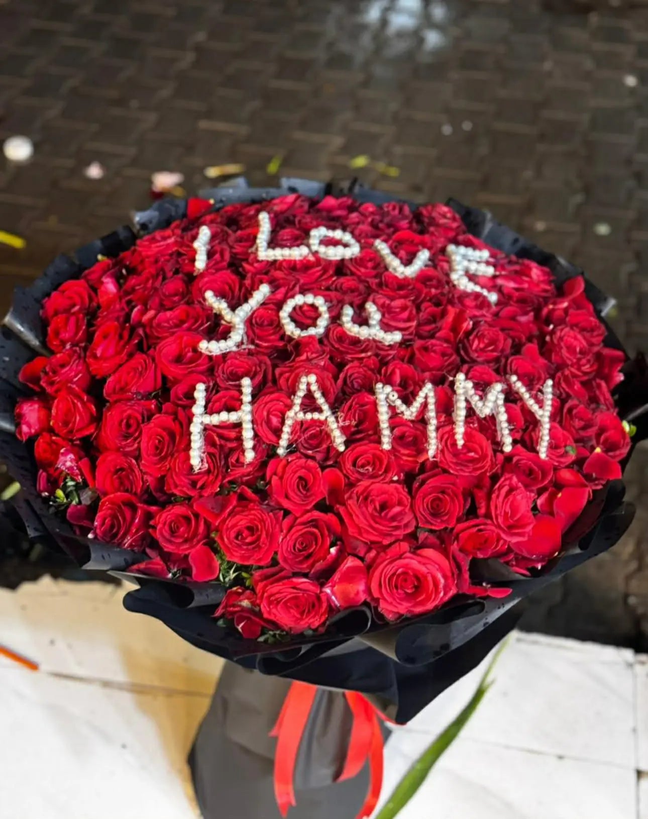 Ultra luxury 150 red rose bouquet with I love you written on roses from giftshop Islamabad
