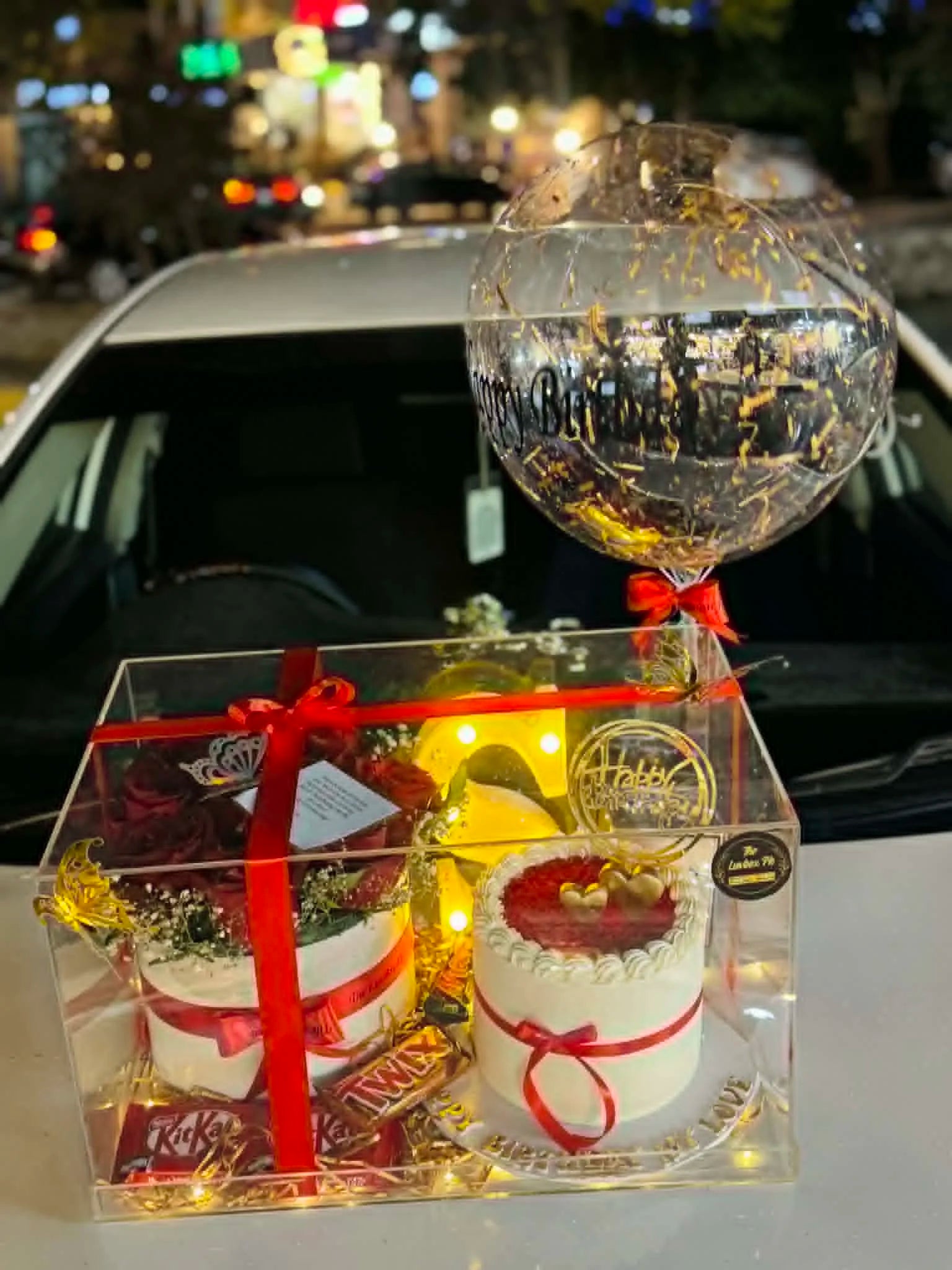 Ultra luxury acrylic gift box with cake roses chocolates LED name and balloon top Pakistan delivery