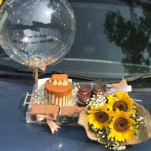 Acrylic tray with cupcakes, brownies, cake, sunflower bouquet and custom balloon – The LuvBox PK