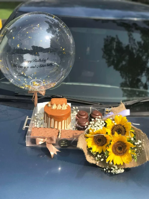 Acrylic tray with cupcakes, brownies, cake, sunflower bouquet and custom balloon – The LuvBox PK