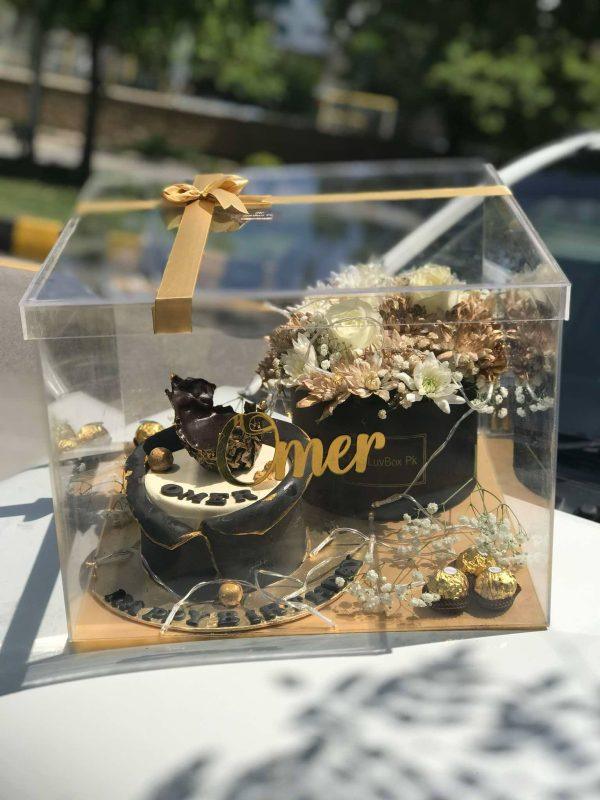 Luxury acrylic gift box with custom cake, Ferrero Rocher chocolates, flowers, and personalized message from The LuvBox PK