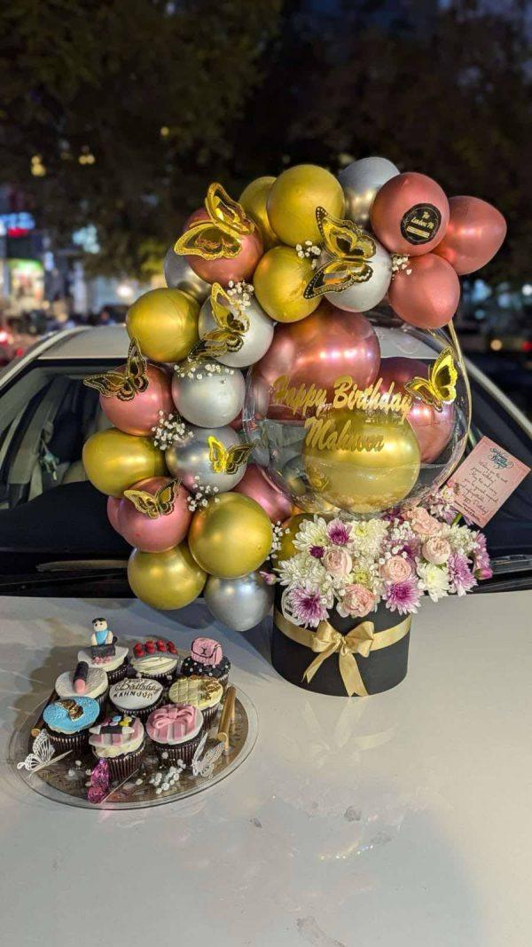 Luxury birthday balloon arch box with 9 custom cupcakes in an acrylic tray by The LuvBox PK