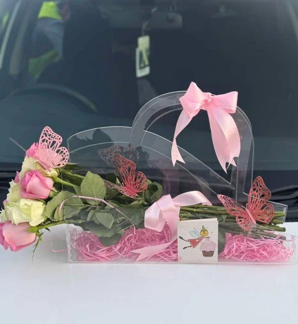 Rosé Luxe premium rose bouquet in acrylic handbag – luxury flower delivery in Islamabad