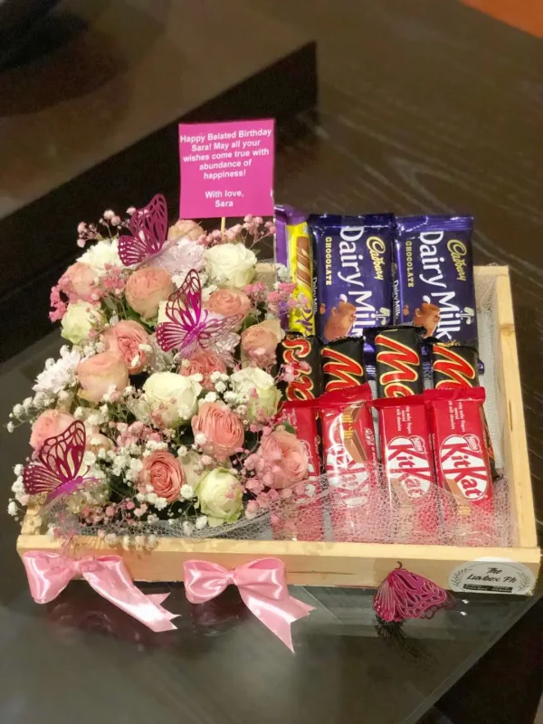 Luxury tray with fresh flowers and assorted chocolates by The LuvBox PK – gift shop in Islamabad