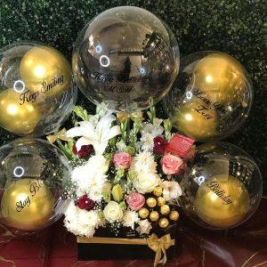 Birthday gift box with multiple transparent customized balloons, chocolates and flowers – The LuvBox PK, gift shop in Islamabad