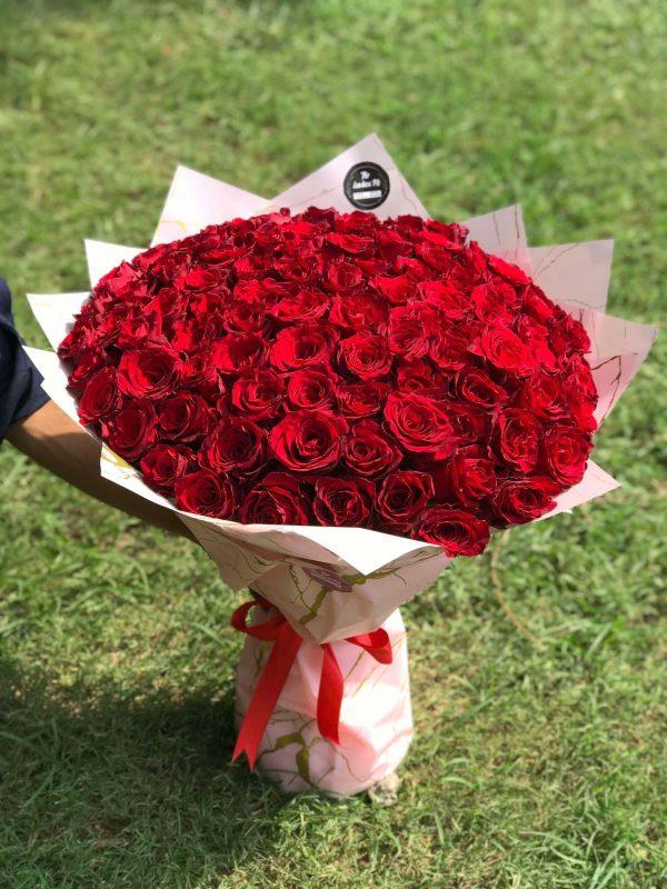 Majestic Roses bouquet with 100 imported red roses – flower delivery in Islamabad