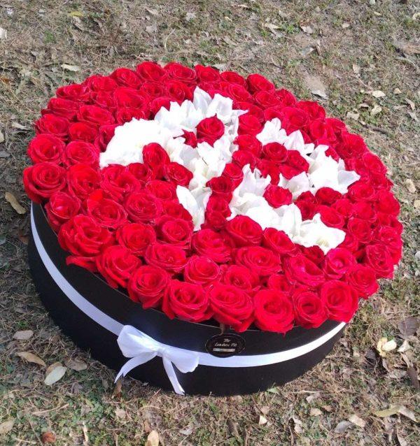 Luxury flower box with 100 roses and custom white letter design – perfect gift from gift shop in Islamabad