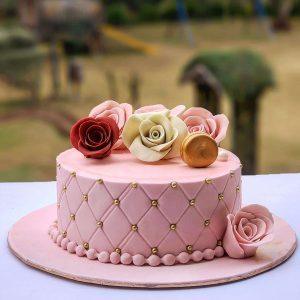 Pink floral fondant cake with luxury finish – birthday or anniversary cake for her in Islamabad.