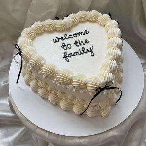 Elegant white heart-shaped fondant cake – perfect for birthday, anniversary or welcome gift in Islamabad.