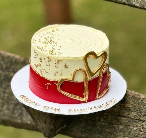 Red and white fondant heart cake – romantic anniversary cake in Islamabad.