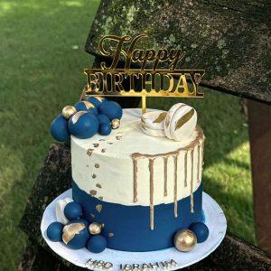 Blue and white fondant birthday cake for him – luxury customized cake in Islamabad.