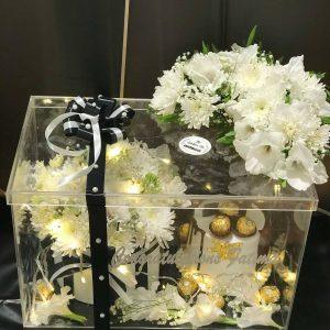 Graduation acrylic box with cake, flowers, and Ferrero Rocher by The LuvBox PK – perfect gift box from gift shop in Islamabad
