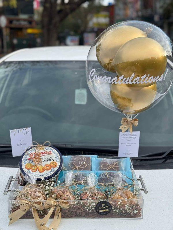 The LuvBox PK Bundle of Joy acrylic tray with dry fruits and custom balloon – newborn gift for him