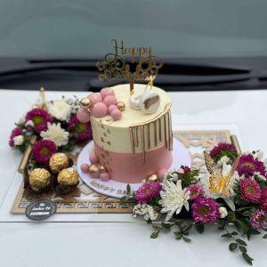 Custom-designed acrylic tray with 2-3 lbs cake and fresh flowers – luxury gift by The LuvBox PK Islamabad