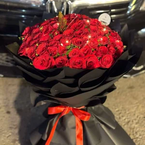 Radiant Rouge LED red rose bouquet with luxury wrapping – Send flowers from Islamabad