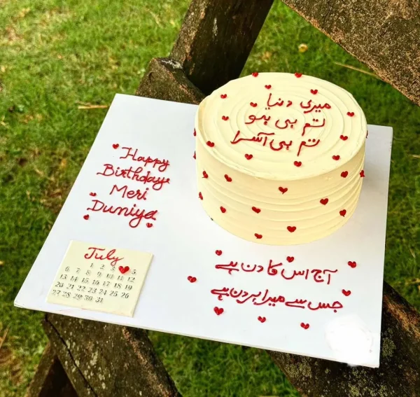 Luxury cake tray with chocolates, flowers, and message board – available for delivery in Islamabad.