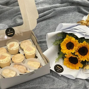 Eid/Hajj Mubarak sweet platter with cake slices, cupcakes, dessert shots, and mini sunflower bouquet – The LuvBox PK