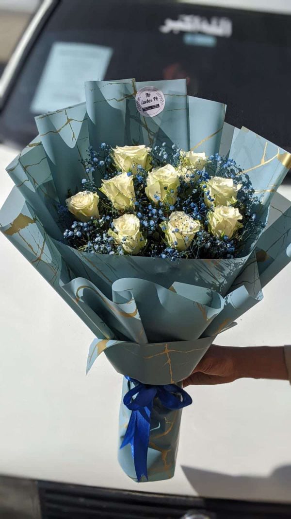Royal Frost – White Roses in Blue Wrap | Gift Shop in Islamabad – The LuvBox Pk