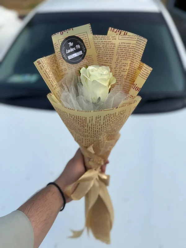 Imported red rose in a premium bouquet wrap – single rose bouquet from The LuvBox PK Islamabad