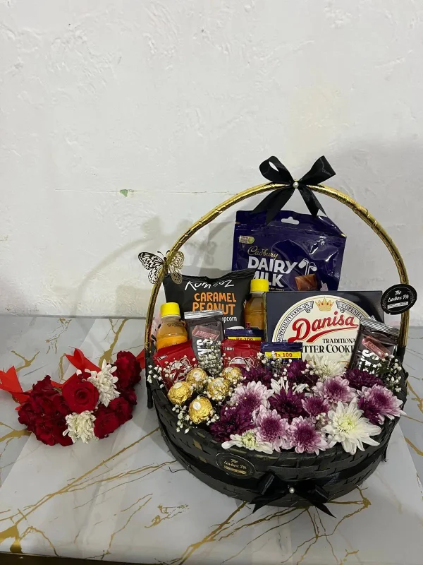 Eid chocolate and snack basket with floral gajray – gift basket by The LuvBox PK Islamabad