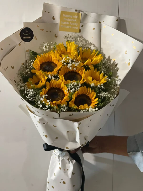 Eid Mubarak sunflower bouquet with rustic wrapping – The LuvBox PK Islamabad